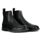 Men's chelsea style boot in black vegan leather. Elastic paneling on sides, pull tab in back, rubber sole with traction.